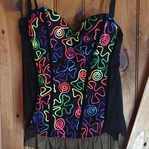 Black corset with multiple neon design.
